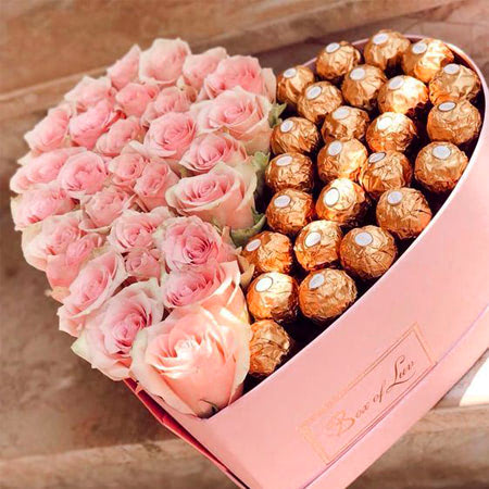 Tặng chocolate và hoa để bày tỏ